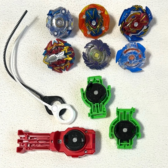 Beyblade Other - Beyblades Bundle: 6 Beyblades, 3 Launchers, 2 Pull Cords.